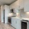 Kitchen with island & stainless steel appliances