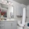 bathroom with a large mirror