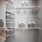 closet with shelves and storage containers