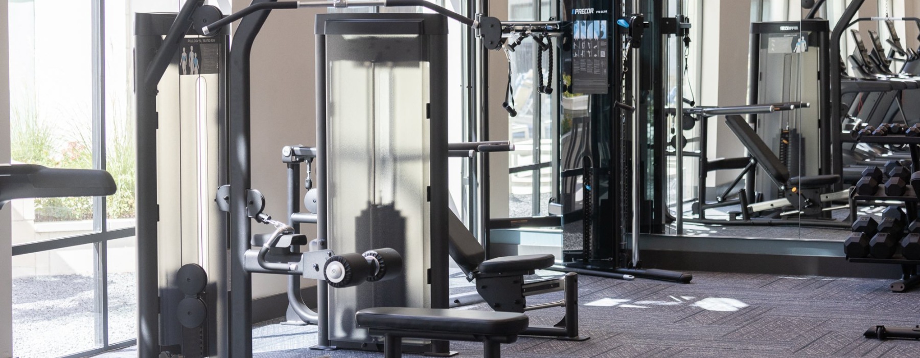 fitness center with exercise equipment