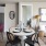 dining area with a table and chairs next to the kitchen