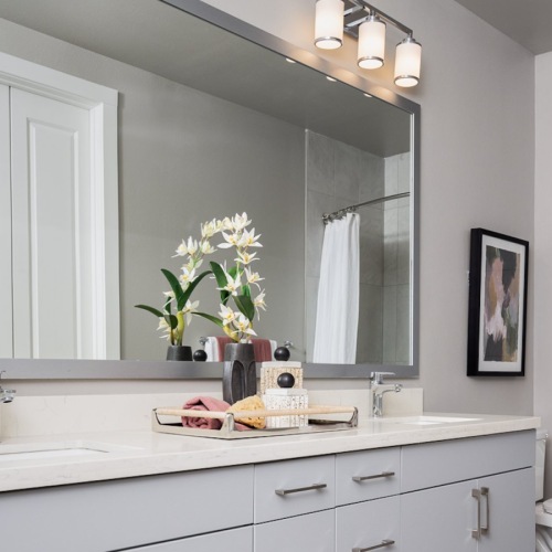 Spacious bathrooms with everything you need bathroom with a large mirror