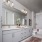 bathroom with a large mirror