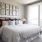 bedroom with large window and bed
