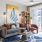 living room with a couch and large windows